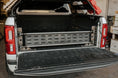 Load image into Gallery viewer, the back end of a white truck with  Internal Tailgate Swingout
