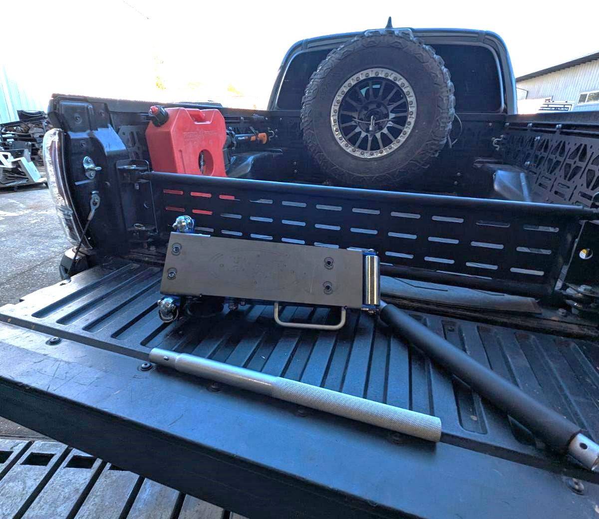 a truck bed with a jack on it