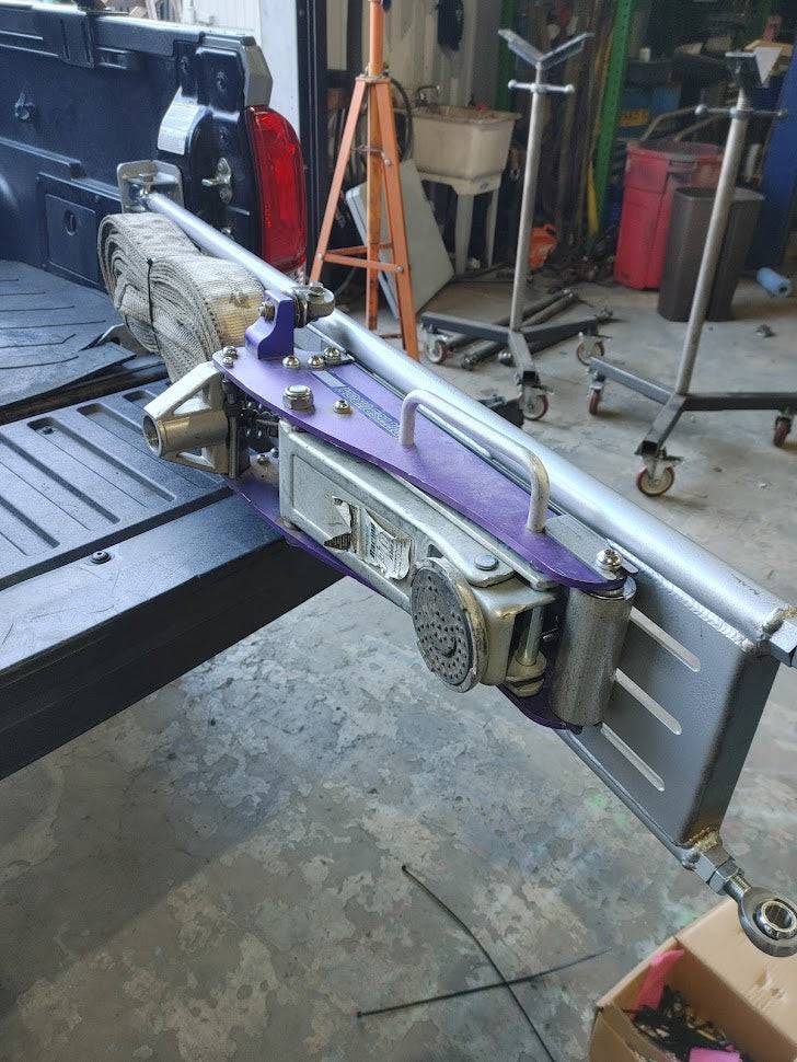 a truck bed with a tool belt attached to it