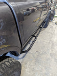Load image into Gallery viewer, a close up of a truck tire on a floor
