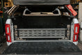 Load image into Gallery viewer, the back end of a truck with the trunk open
