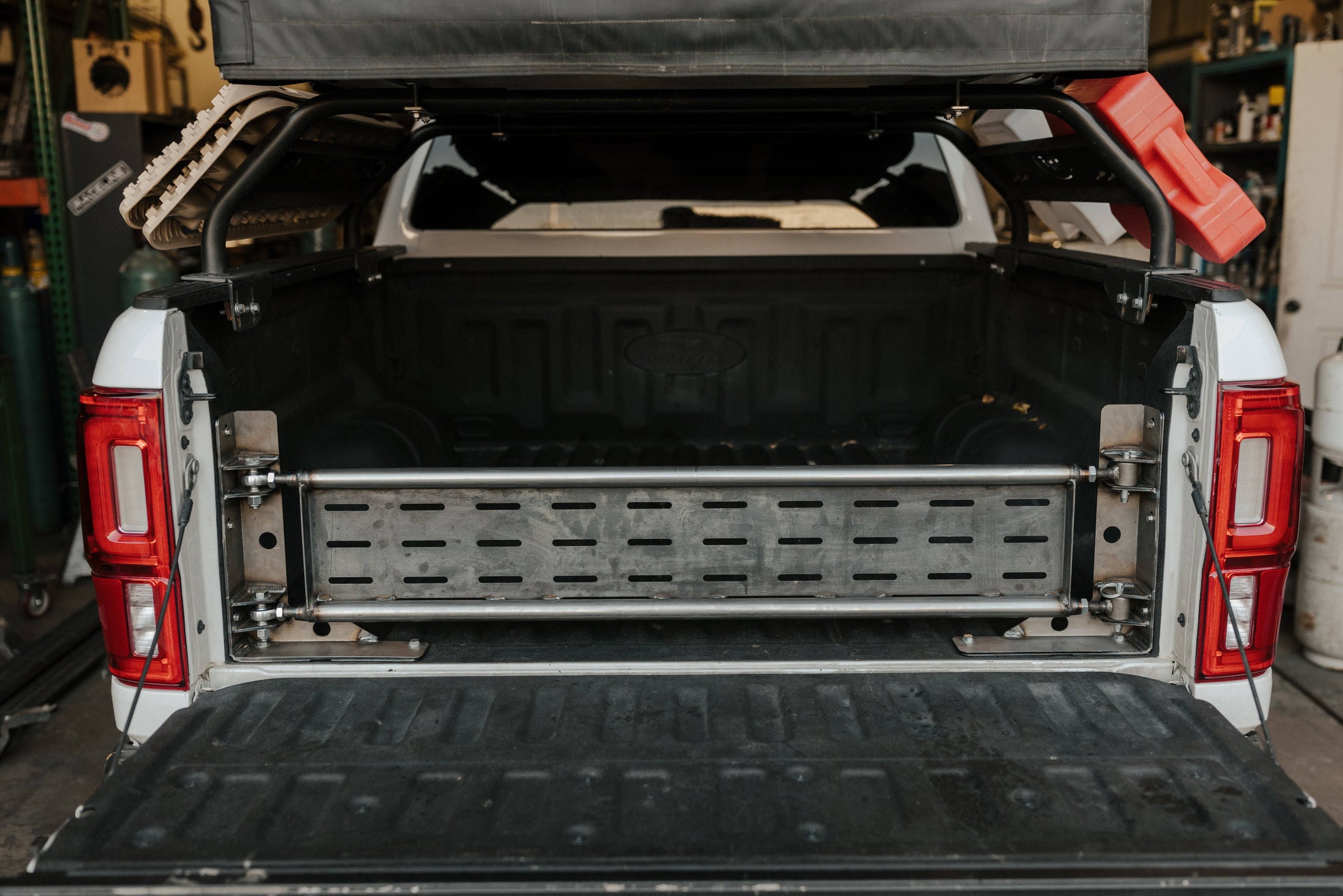 the back end of a truck with the trunk open