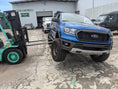 Load image into Gallery viewer, a blue pick up truck pulling a fork lift
